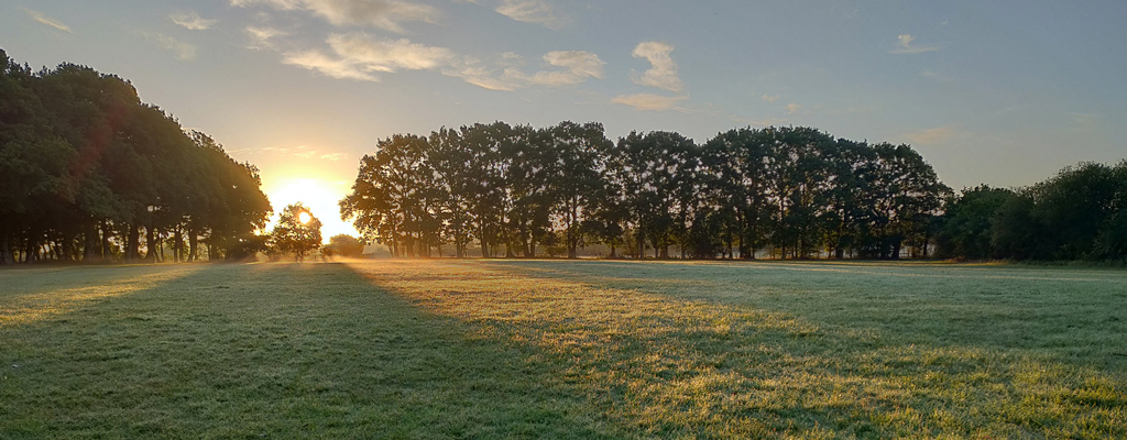 Sunrise over the playground field