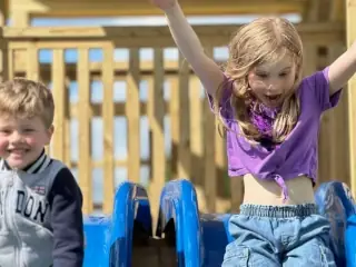Children enjoying the slides